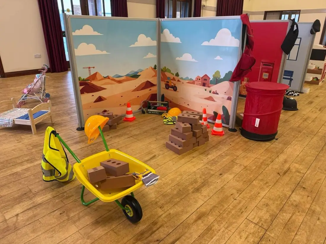 Children enjoying the Toddler Town pop-up role play town