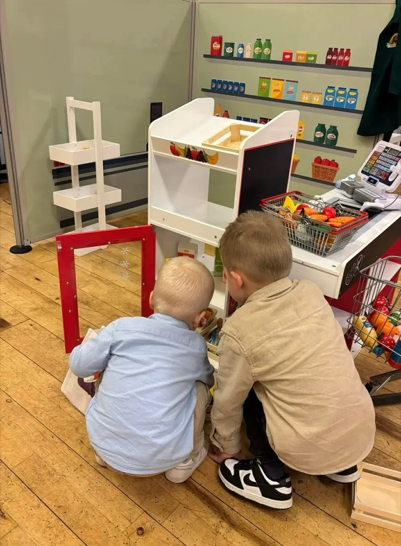 Toddler playing in the Toddler Town cafe